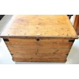 Large 19th Century pitch pine carpenters chest, the hinged cover revealing a decorative veneered and