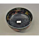 Moorcroft Pomegranite pattern fruit bowl, 8.5ins diameter (hairline crack and chip to foot rim)