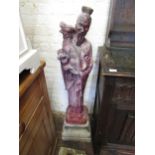 Red patinated concrete garden oriental figure on a square stepped base
