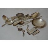 Miscellaneous small items of silver to include a skewer, two money clips, two napkin holders,