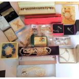 Box containing a quantity of silver and other costume jewellery, in original boxes