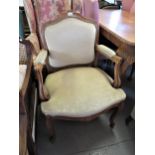 Reproduction French walnut and upholstered open armchair on cabriole front supports