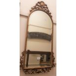 20th Century dome topped gilt framed wall mirror with C-scroll and shell surmount, with bevelled