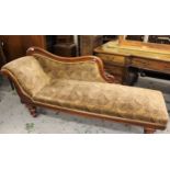 Victorian mahogany chaise longue raised on turned tapering supports