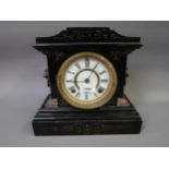 19th Century American black japanned and painted metal mantel clock, the enamel dial with Roman