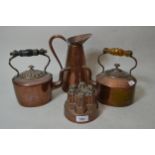 19th Century copper castellated jelly mould with tinned interior, two copper kettles and a copper