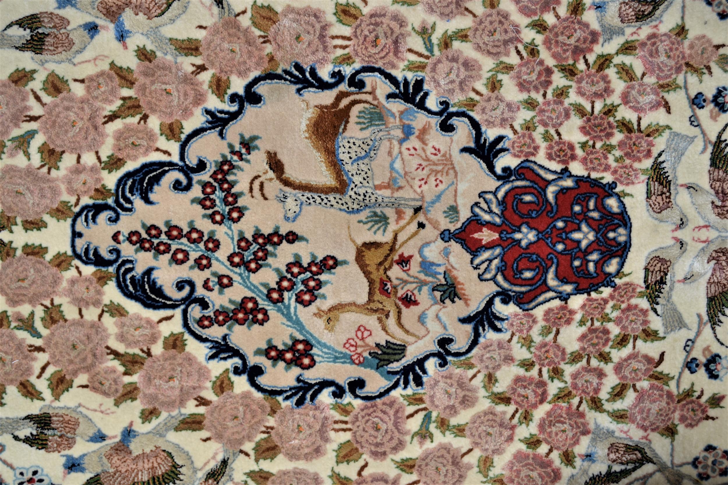 Isfahan part silk rug with a medallion, pictorial and all-over floral design on an ivory ground with - Image 2 of 13