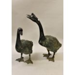Pair of 20th Century patinated bronze garden figures of full scale geese