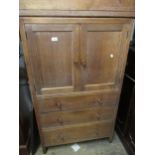 Heals limed oak compactum cabinet with two doors above three drawers with knob handles, 31ins wide