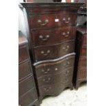 Early 20th Century mahogany serpentine fronted small tallboy in Georgian style with six drawers