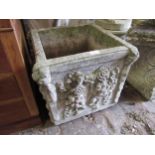 20th Century reconstituted stone square garden planter with floral swag decoration, 18ins high x