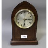 Edwardian mahogany and black line inlaid lancet shaped mantel clock, the silvered dial with Roman