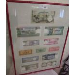 Twelve various Cambodian bank notes mounted in a single frame