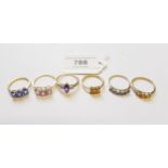 Group of six 9ct gold and gem set dress rings