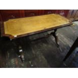 Reproduction mahogany leather inset coffee table on turned end supports with splay feet