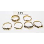 Group of four yellow metal gem set dress rings and a 9ct gold wedding band, 6.5g together with a 9ct