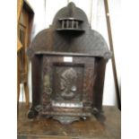 19th Century carved oak hanging wall cabinet, together with a beech bedside cabinet