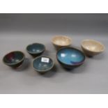 Chinese blue glazed pottery bowl, 5.25ins diameter, three similar smaller bowls and a pair of slip