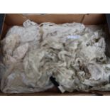 Two boxes of various lacework including a black Chantilly shawl