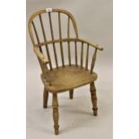 Childs late 19th/early 20th Century oak and elm Windsor armchair on turned supports