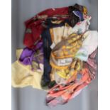 Bag containing a collection of approximately fifteen various silk ladies scarves