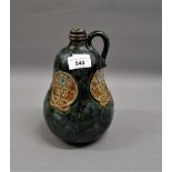 Royal Doulton stoneware baluster form Whisky flask together with a large terracotta jar, cover and