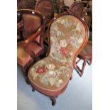 Victorian walnut low seat nursing chair with original needlepoint upholstery