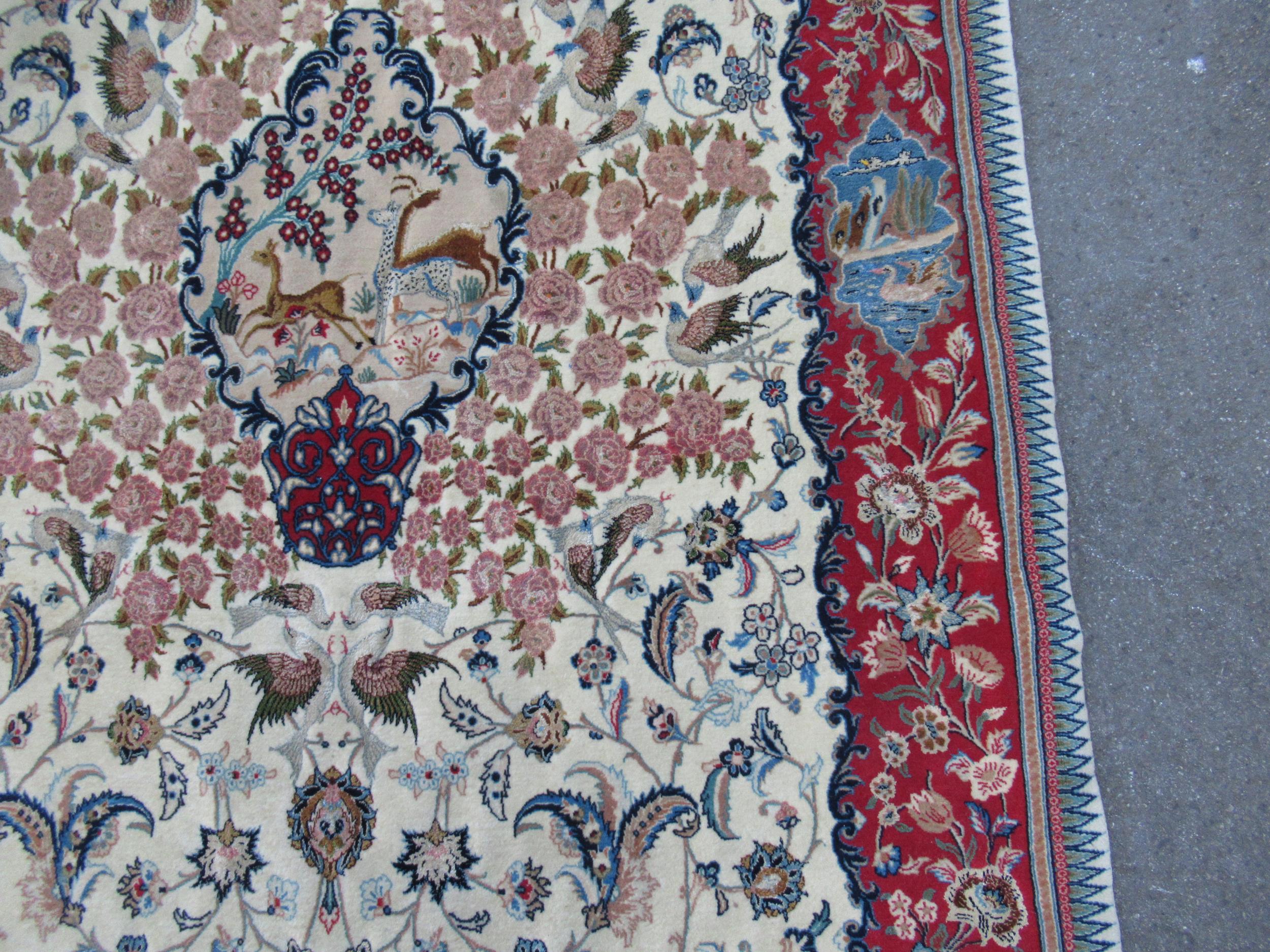 Isfahan part silk rug with a medallion, pictorial and all-over floral design on an ivory ground with - Image 7 of 13