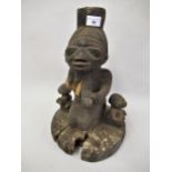 African Yoruba carved hardwood maternity figure, 16ins high (damages)