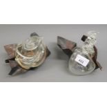 Pair of contemporary patinated metal and blown glass bottles, each approximately 4ins high