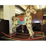 Mid 20th Century child's painted metal rocking horse