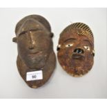 Small New Guinea carved wooden mask, 6.5ins high together with a small African wooden mask, 10.