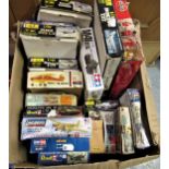 Eighteen boxed plastic model kits including Tamiya, Airfix and Heller Quite a few of these are