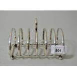 Birmingham silver six division toast rack on ball supports