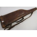 19th Century brown leather leg of mutton gun case with original carrying handle and strap, stamped
