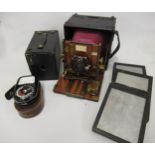 Sanderson mahogany and brass quarter plate camera with three plate holders and glass viewing screen,
