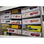 Box containing a quantity of Atlas reproduction Dinky Supertoys lorries in boxes