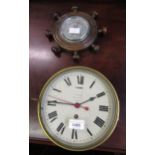 Early 20th Century brass cased circular ship's clock having painted dial with Roman numerals, slow /