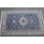 Small Indo Persian carpet with a lobed medallion and all-over Palmette design on a blue ground