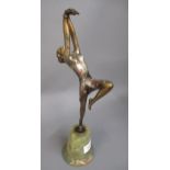 Josef Lorenzl, Art Deco bronze patinated and painted figure of a dancing girl, on green marble