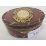 18th / 19th Century French oval tortoiseshell gold mounted and inlaid box, the cover having an inset