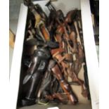 Box containing a quantity of 20th Century African carved hardwood figures