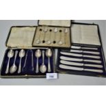 Cased set of six silver teaspoons with sugar tongs together with a cased set of six silver coffee