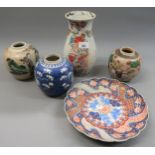 Chinese porcelain baluster form vase, three Chinese ginger jars and an Imari plate Small repaired