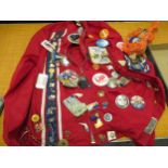 American Swingster red tunic with multiple badges, together with a quantity of loose linen badges