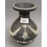 Wedgwood Etruria jasperware black and white baluster form vase with floral swag decoration (foot