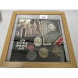 German Third Reich World War II medal and badge group including an Iron Cross relating to Wilhelm