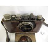 Early Leica I 35mm camera, Serial No. 225, with a Leitz Anastigmat 50mm lens, with original brown