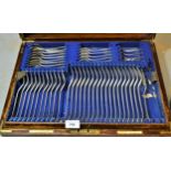 Goldsmiths & Silversmiths Company, oak cased canteen of silver plated Old English pattern cutlery (