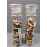 Pair of large glass confectionary jars with covers, 20.5ins high